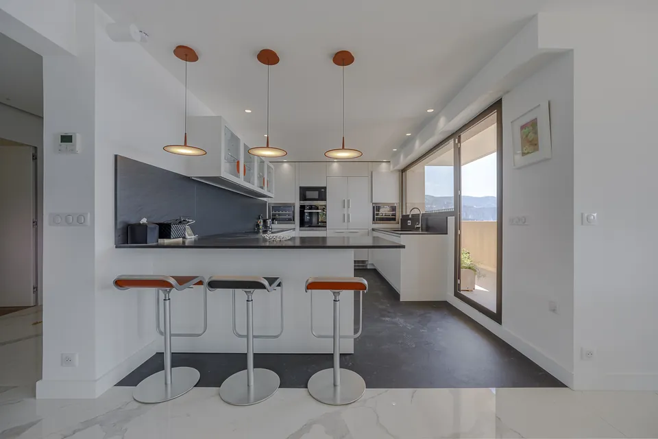 Azura Apartment — The kitchen and its central island
