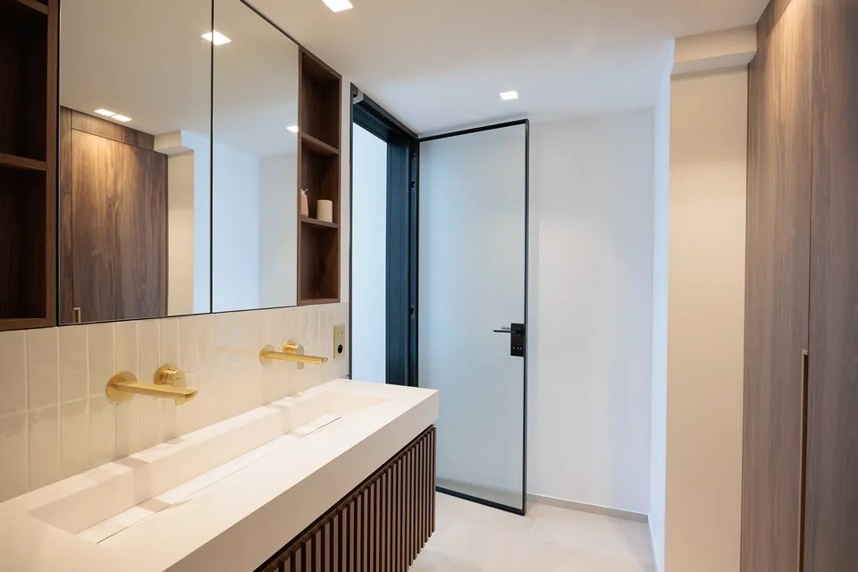 Sienna Apartment — The bathroom in soft shades