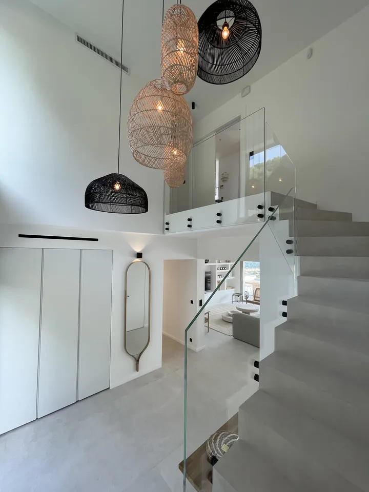 Villa Canopée — the entrance and the double-height space, after the renovation