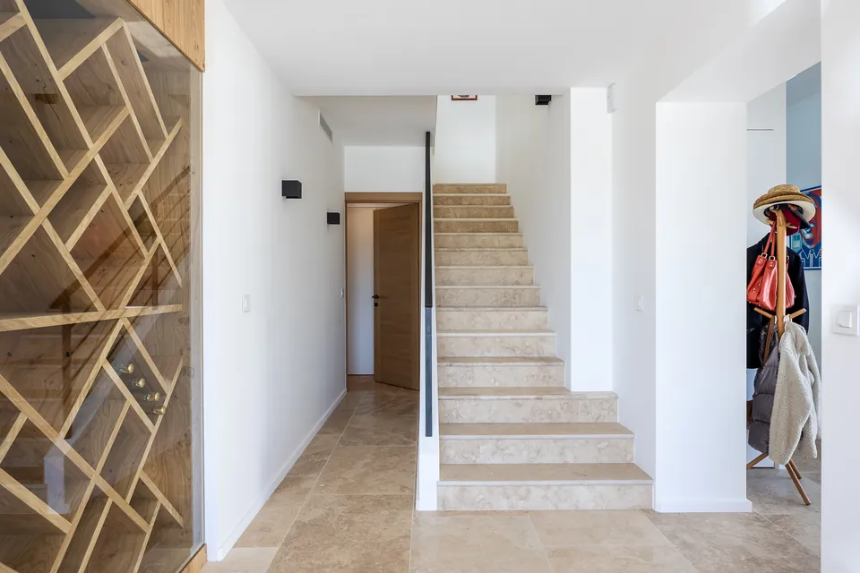 Villa Mélodie — the entrance and the staircase, after the renovation