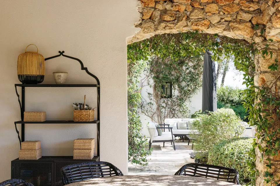 Villa Olivine — The terrace sheltered beneath the beams