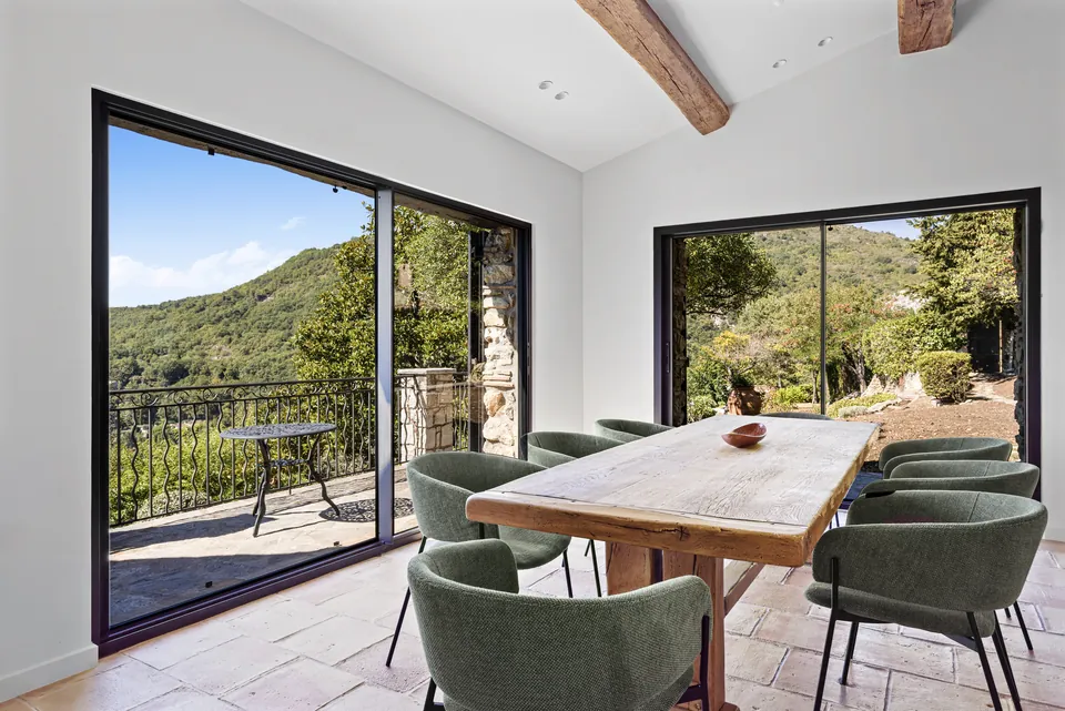Villa Sola — The dining room opening onto the landscape